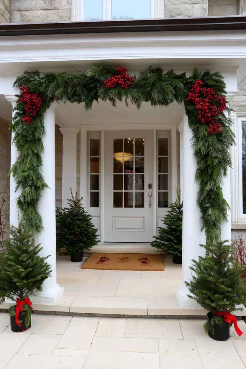 asymmetrical garland framing the door, topped with clusters of bright red berries 1