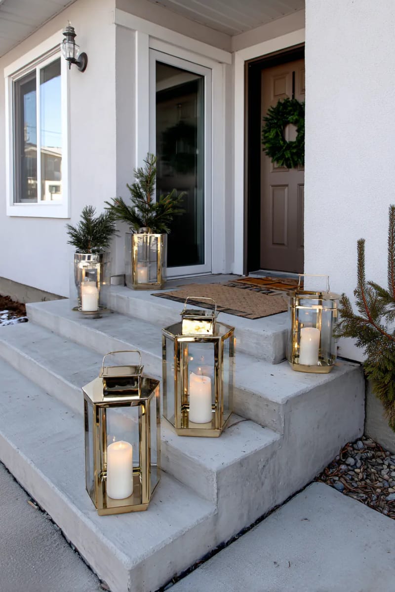 cluster of gold lanterns with flameless candles beside the steps 1