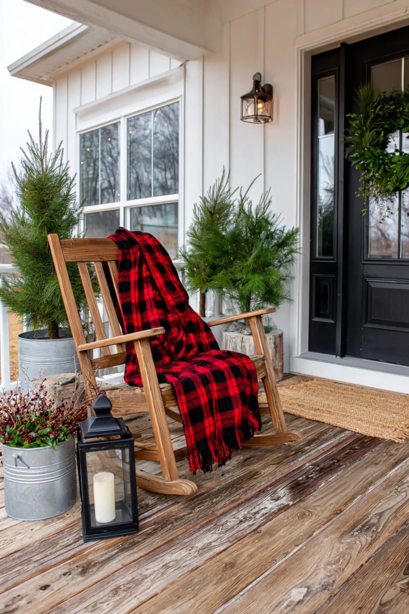 cozy plaid blanket draped over rocking chair with lantern nearby 1