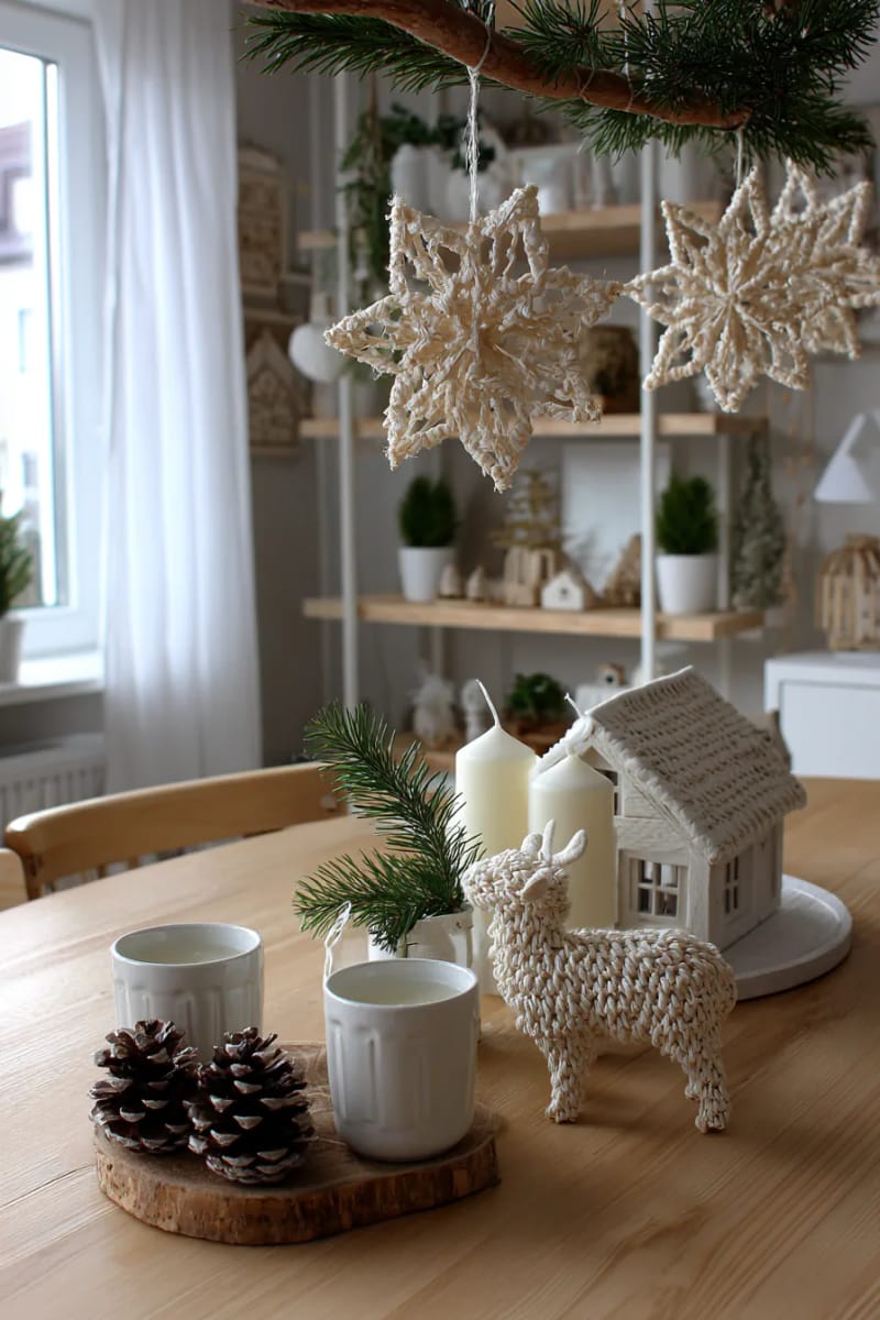 21 Scandinavian Christmas Decorations Ideas To Bring Nordic Charm at Home 22 delicate straw goat ornaments and snowflakes for a traditional touch 1