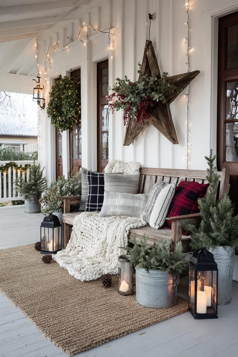 diy wooden star with eucalyptus and berries above the porch bench 1