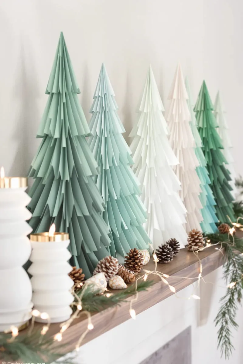 folded paper christmas trees in ombre colors for shelf styling 1