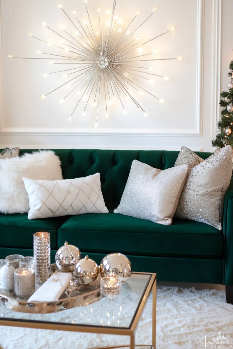 hang metallic starburst wall art above a velvet sofa for festive glam. 1