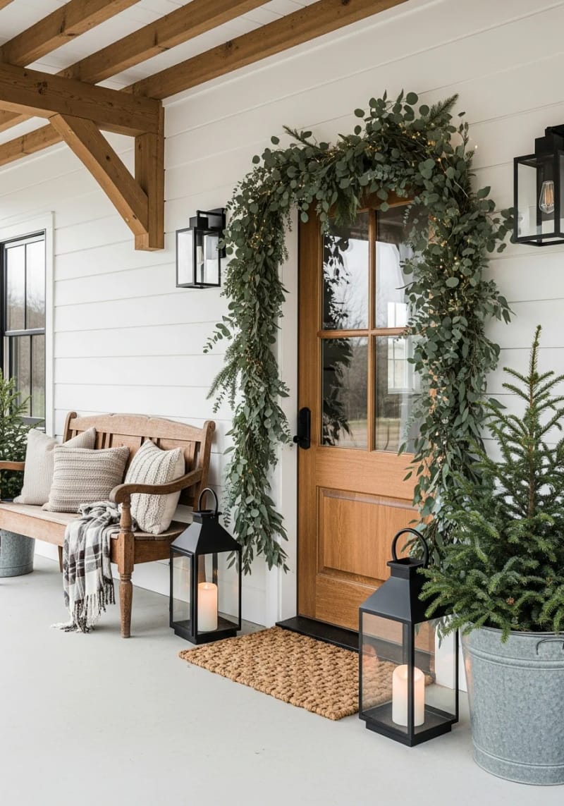 minimal garland with eucalyptus draped around the door frame 1