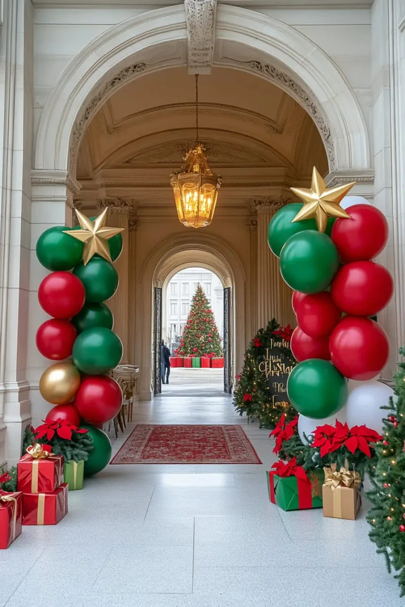 21 Christmas Balloon Decor Ideas for a Fun and Festive Holiday 20 red and green balloon columns topped with golden stars at party entrance 1