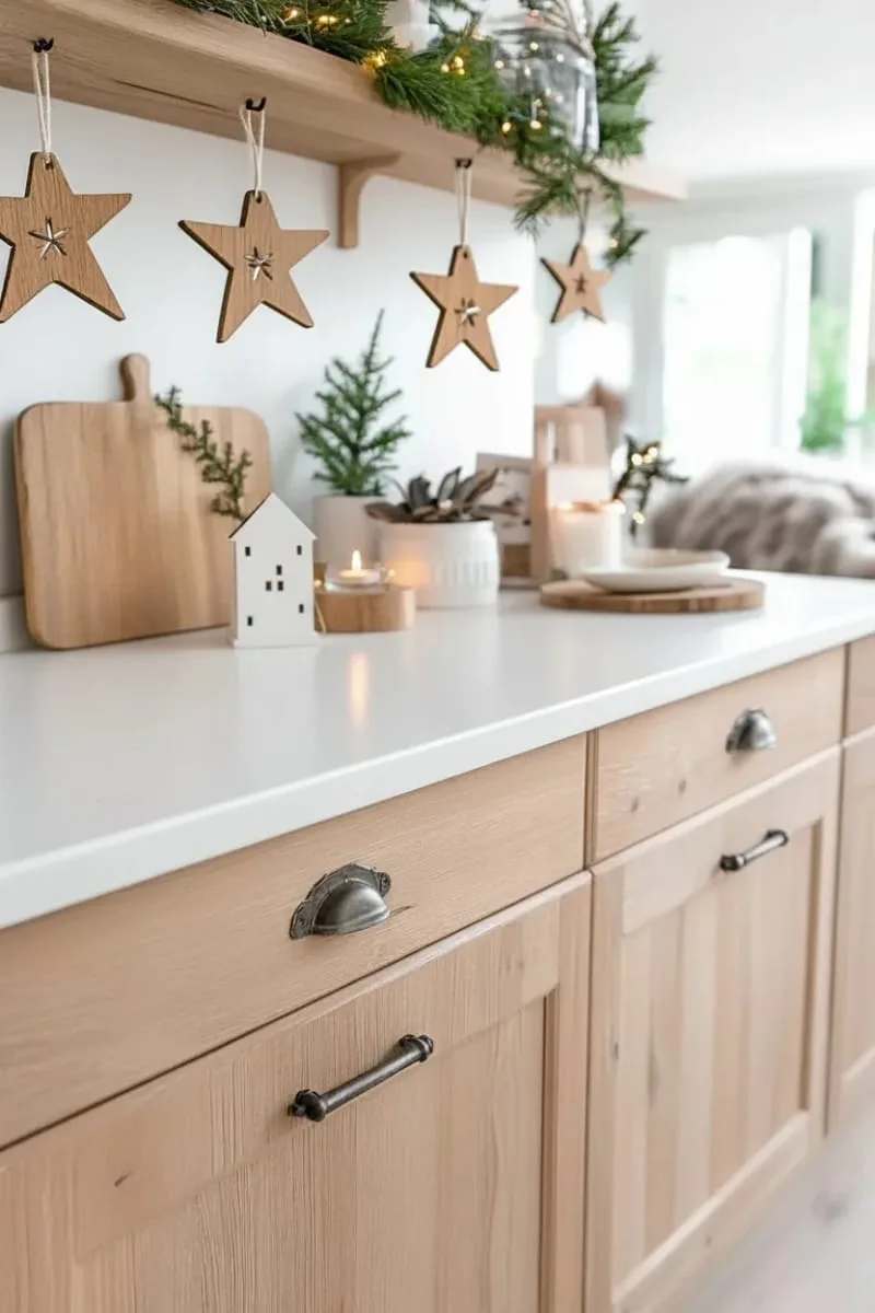 scandinavian-inspired wooden stars hung from cabinet pulls 1