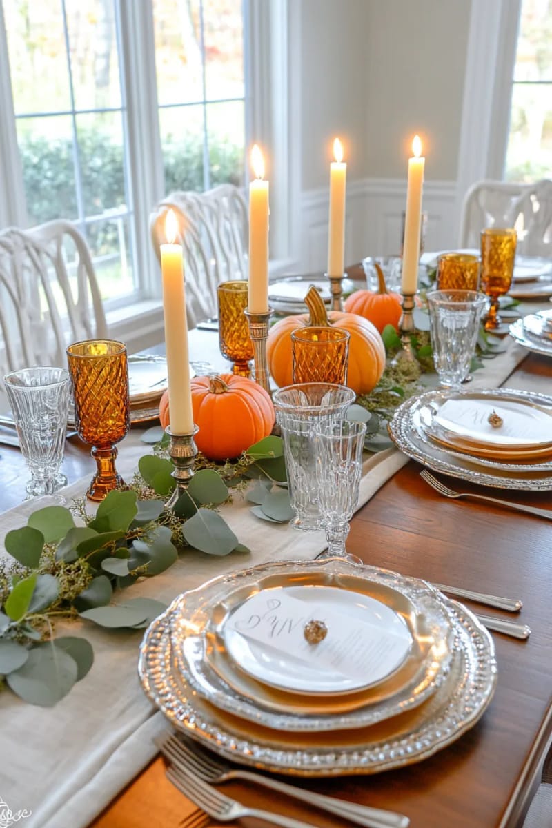 vintage-inspired mercury glass candleholders paired with amber glassware 1