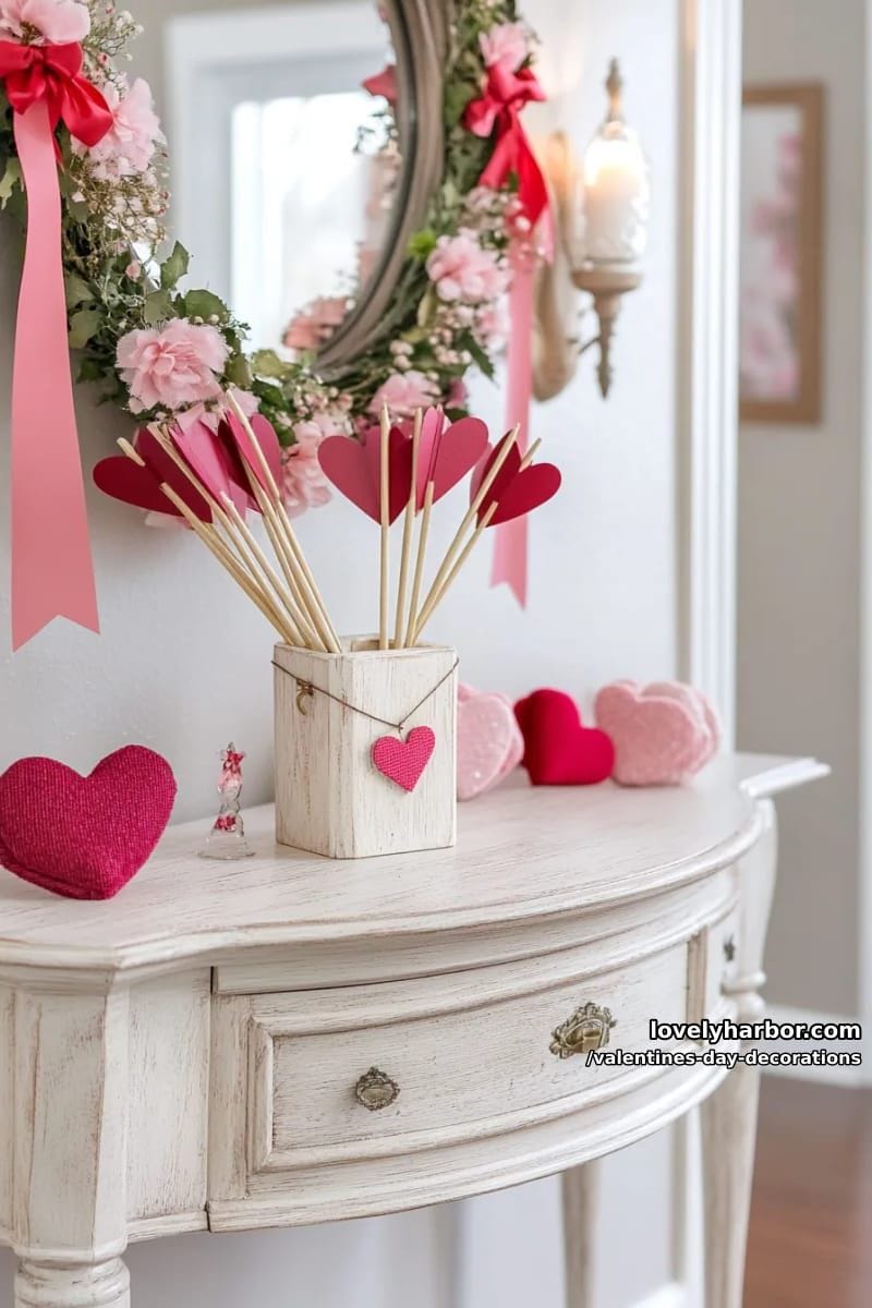 diy cupid bow and arrow display by the entryway 1