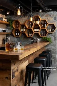 moody whiskey cellar bar with honeycomb bottle she 3