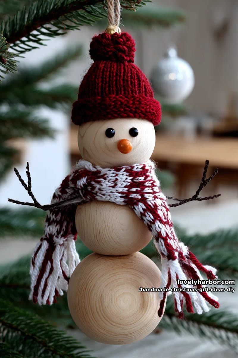 wooden bead snowman ornament with a tiny knitted hat and scarf 1