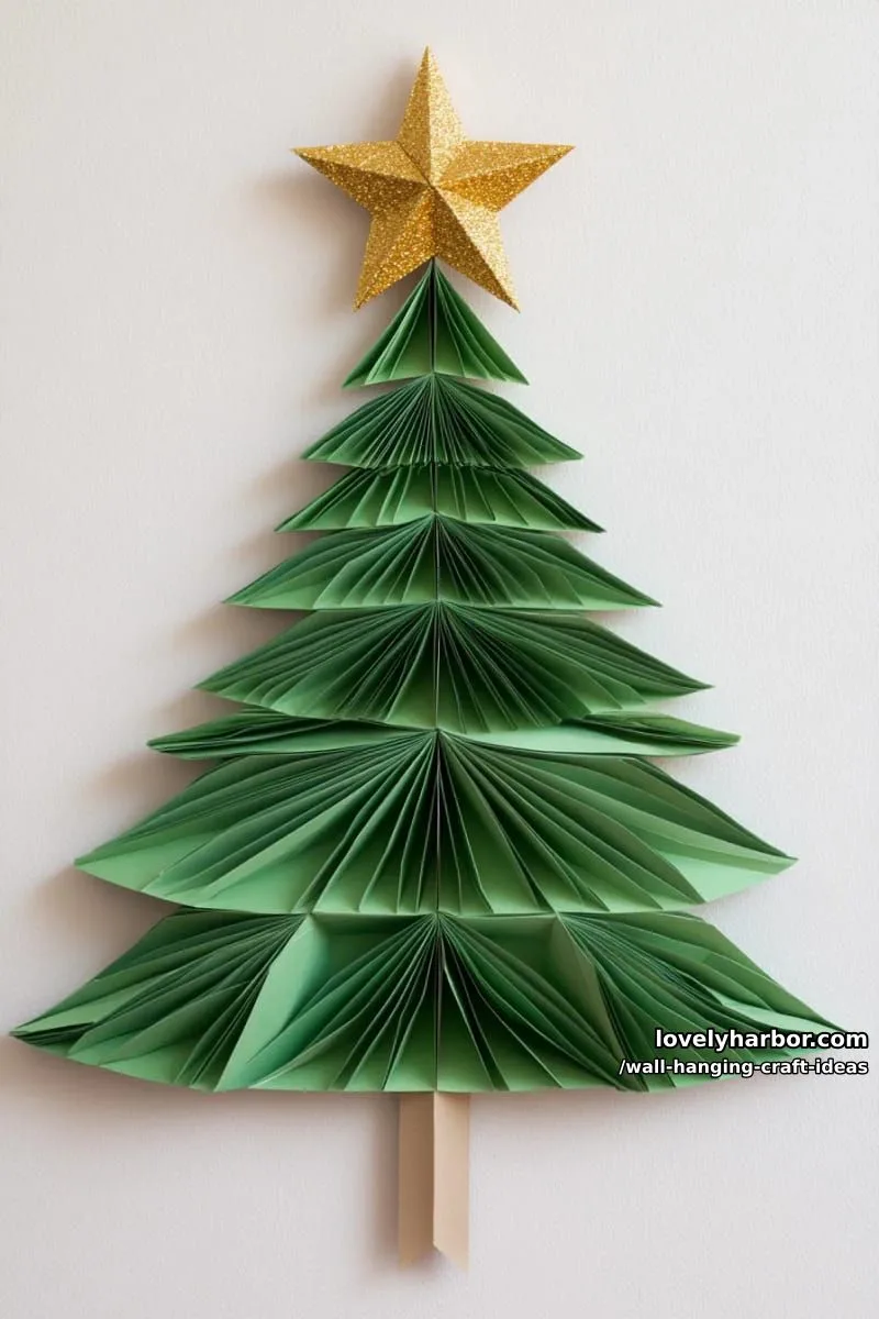 15 Artistic Wall Hanging Crafts to Upgrade Your Home 17 construct a hanging christmas tree with tiered green paper branches and gold star. 1