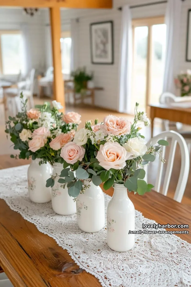 19 Classy Small Flower Arrangements to Cheer You Up in Spring 9 group of pastel roses with eucalyptus in vintage milk bottles 1