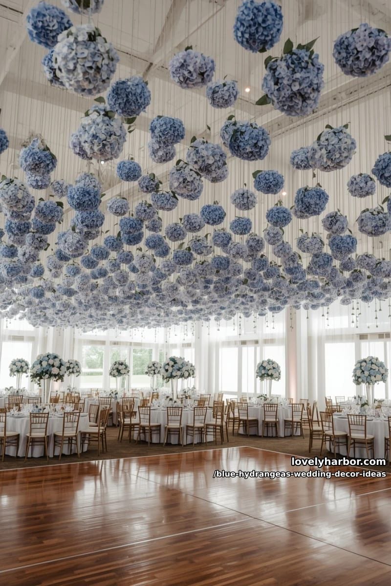 delicate hanging blue hydrangea stems above reception dance floor 1
