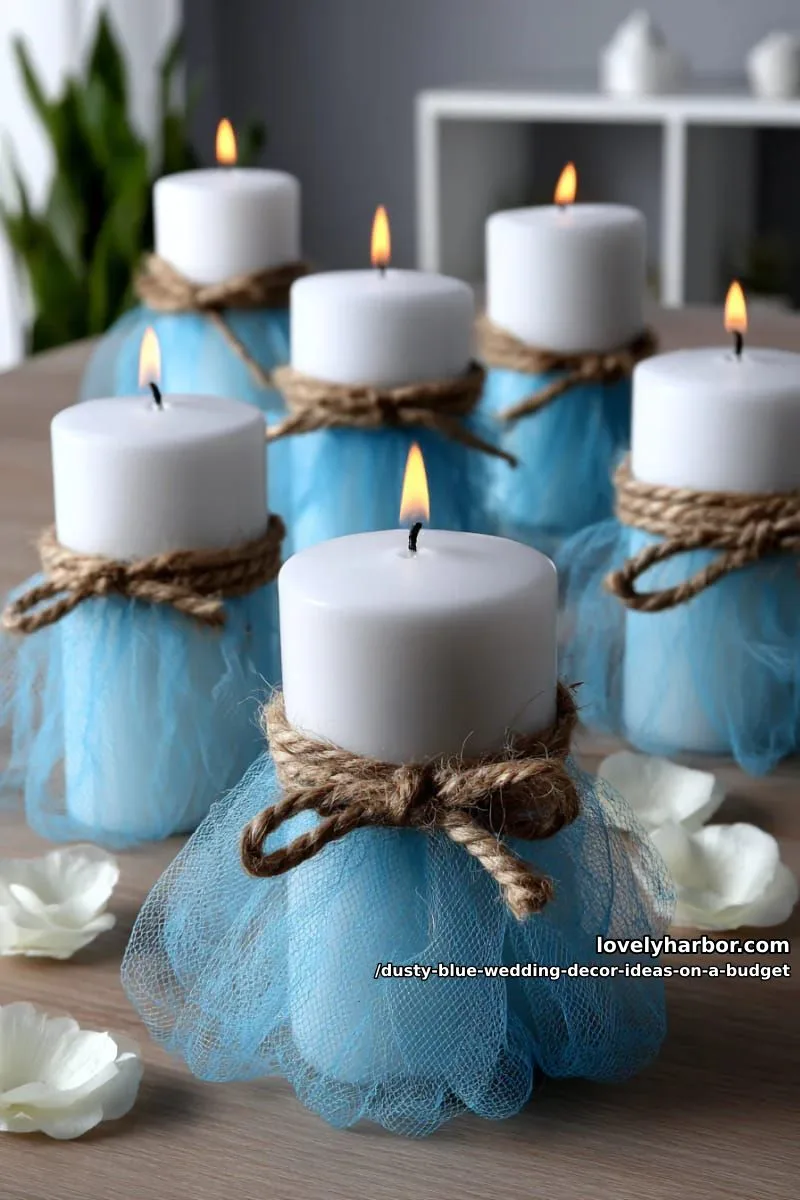 dollar store pillar candles wrapped in blue tulle and twine 1