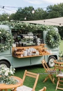 mobile coffee van adorned with greenery and fresh eucalyptus wreaths 15