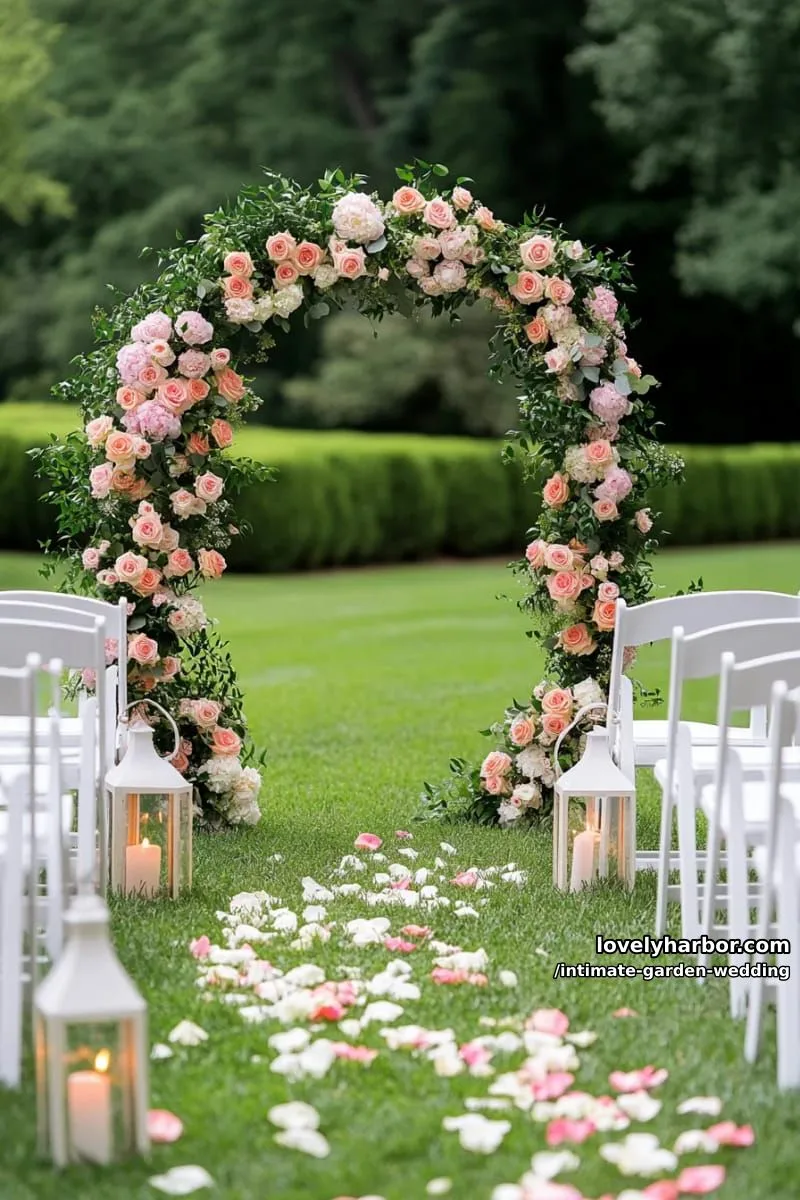 petite flower arch covered in climbing roses and lush greenery 1