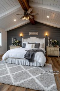 farmhouse bedroom with ruffled bed, gray accent wall, and vaulted shiplap ceiling. 63