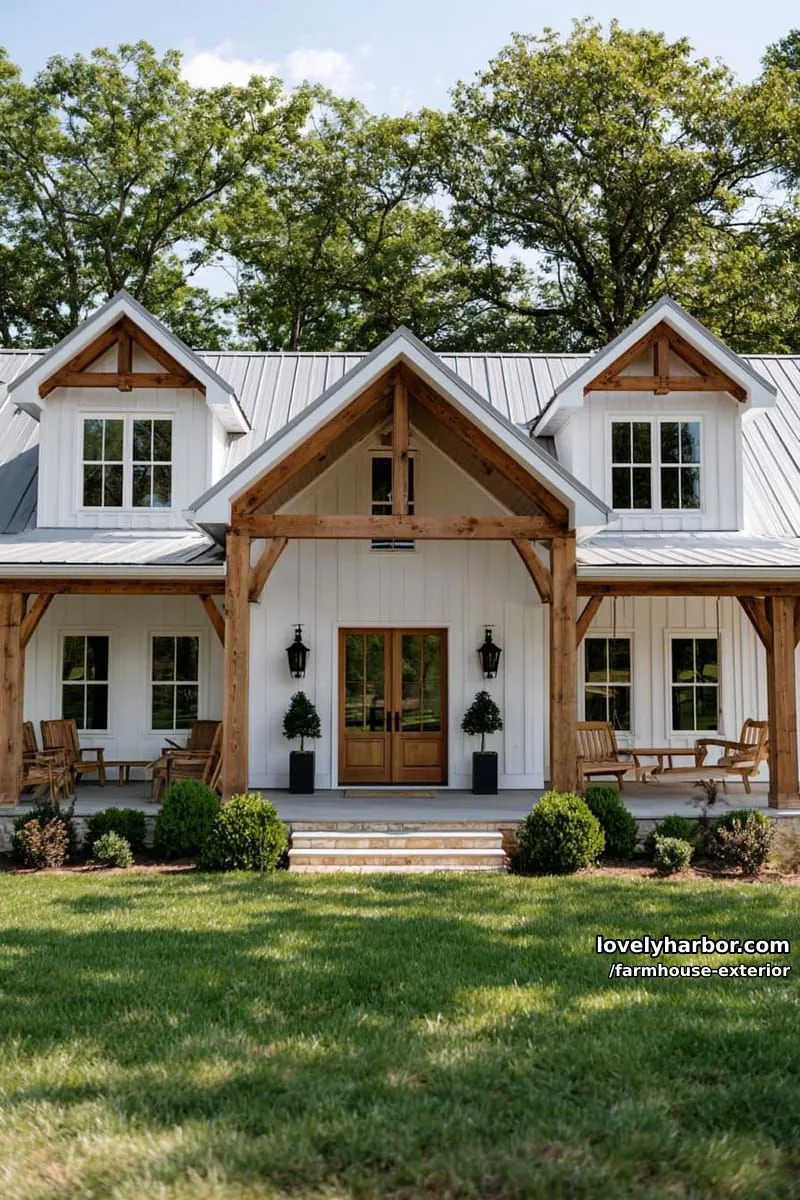 44 New Farmhouse Exterior Designs To Copy 40 large farmhouse, gray roof, wraparound porch, double doors, manicured shrubs, clear sky. 1