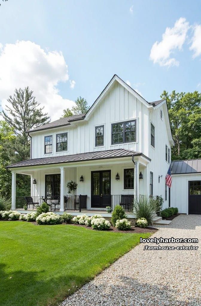two-story white farmhouse, black railings, double doors, flag, manicured gardens. 1