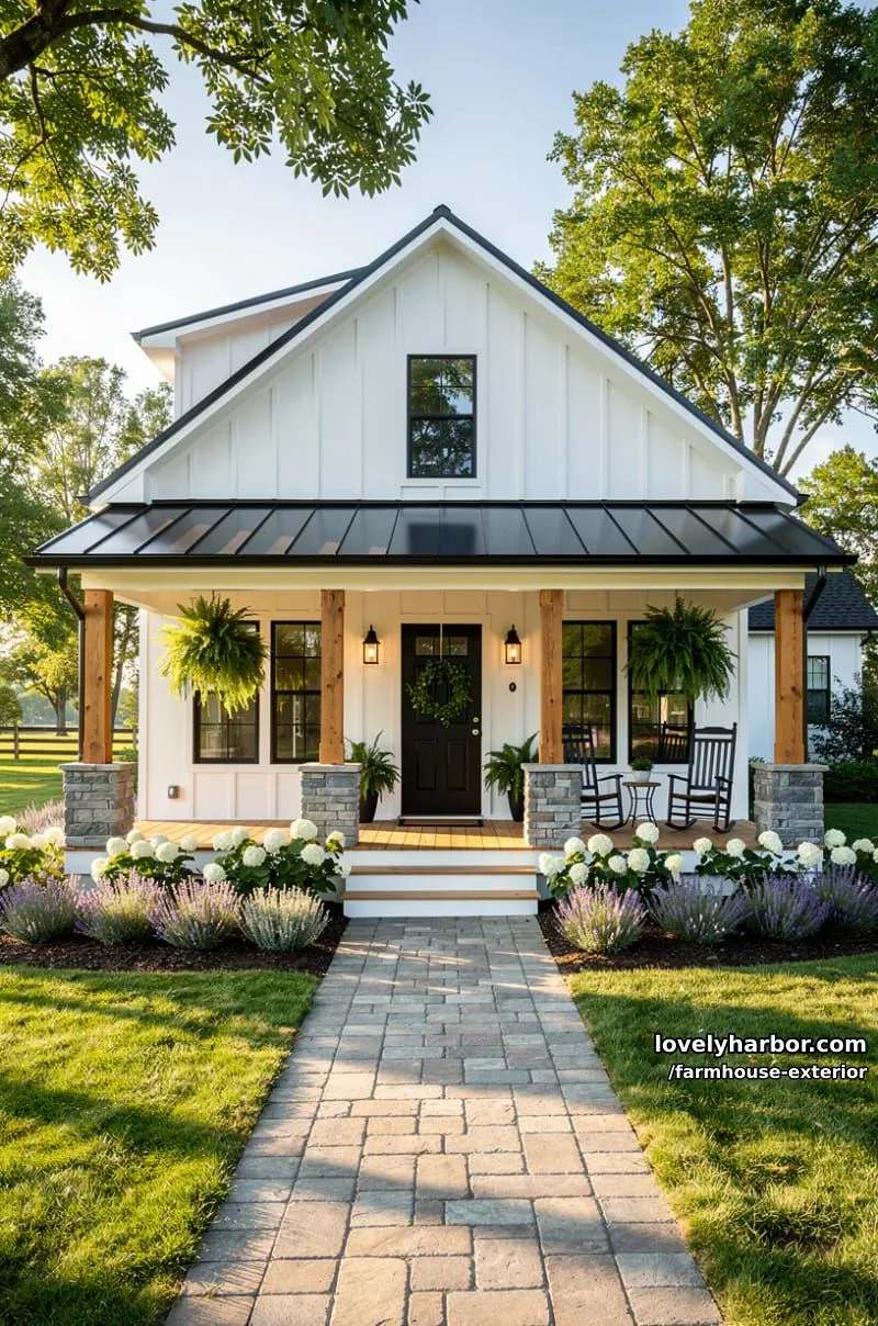 44 New Farmhouse Exterior Designs To Copy 2 white farmhouse with black windows, gabled roof, and welcoming porch with greenery. 1