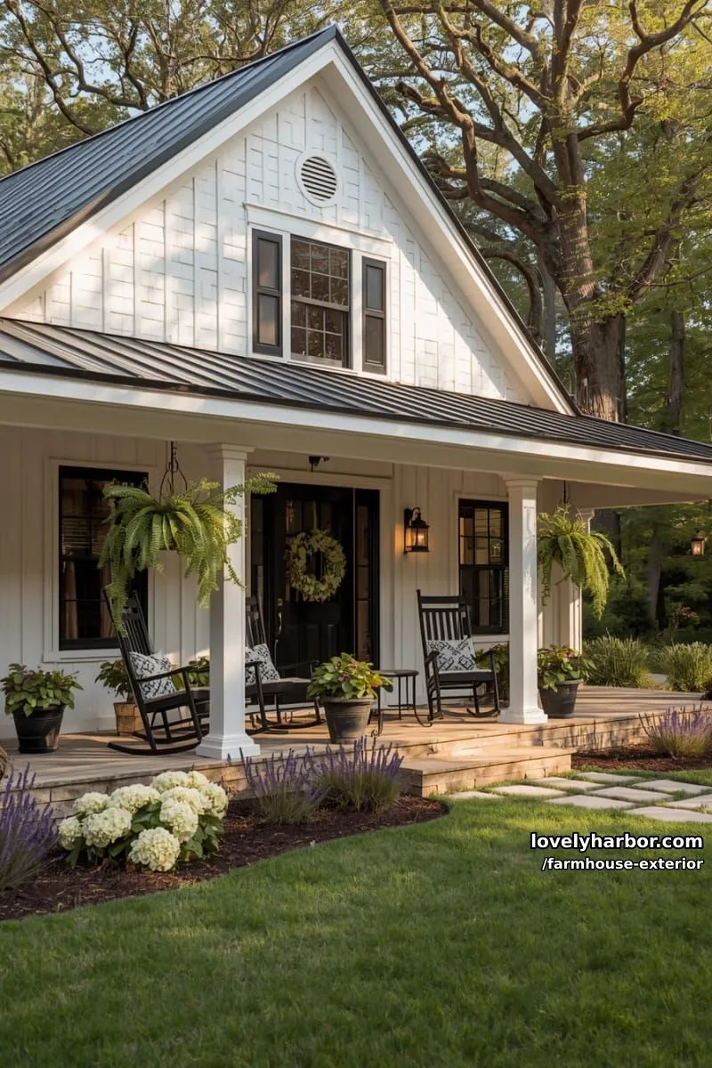 44 New Farmhouse Exterior Designs To Copy 3 white farmhouse with black windows, gabled roof, and welcoming porch with greenery. 1