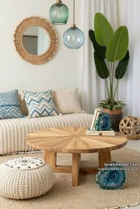 coastal boho scene with sunburst coffee table, rattan, shells, and blue accents. 17