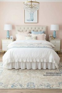 pastel feminine bedroom, tufted headboard, blue boot art, crystal chandelier. 16