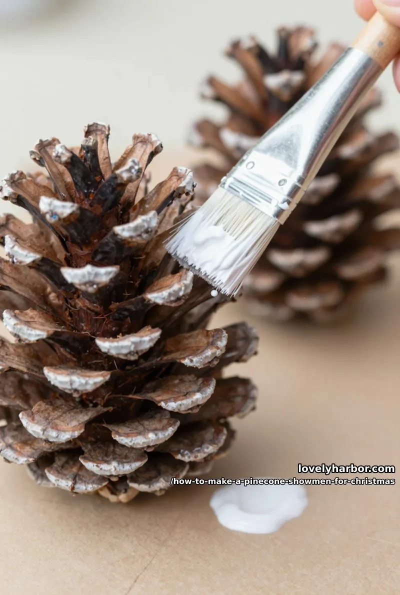 How to Make a Pinecone Snowman for Christmas: DIY Guide 4 step 2: dab on the snow 1