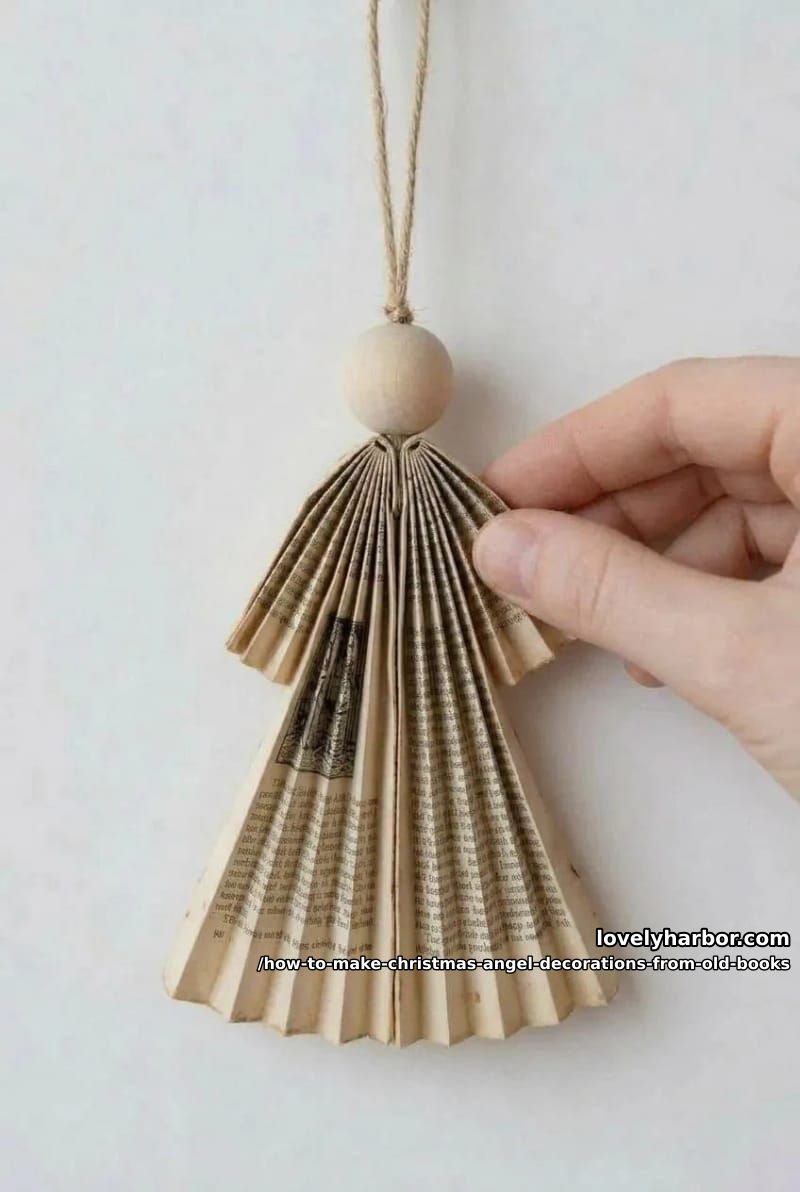 How to Make Christmas Angel Ornaments From Old Book Pages 10 step 5: add the bead head and twine hanger 1