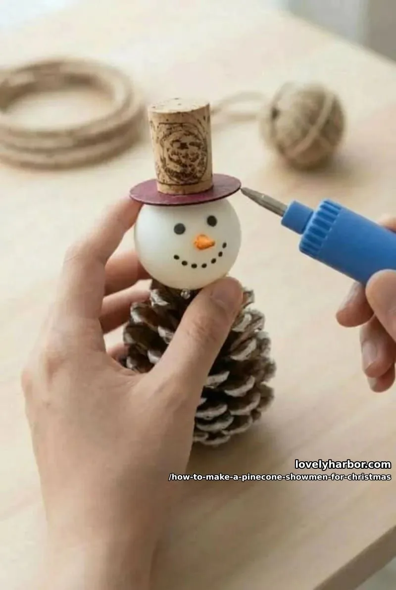 How to Make a Pinecone Snowman for Christmas: DIY Guide 10 step 5: assemble and tie the scarf 1