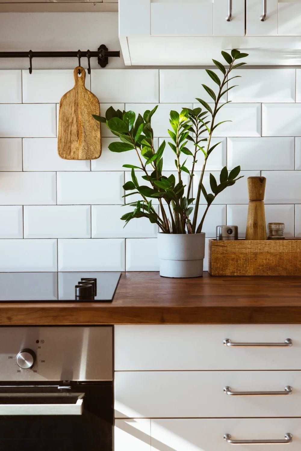 Cozy Kitchen Ideas That Actually Make You Want to Linger 4 a wood countertop warms a cozy kitchen faster than a backsplash ever will 1