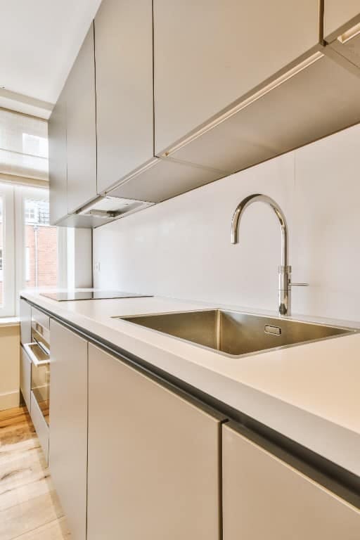 beige cabinets with white countertops: warm the white, or don't bother 1