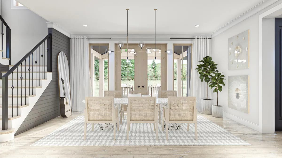 formal dining opens to the porch through full-height glass 1