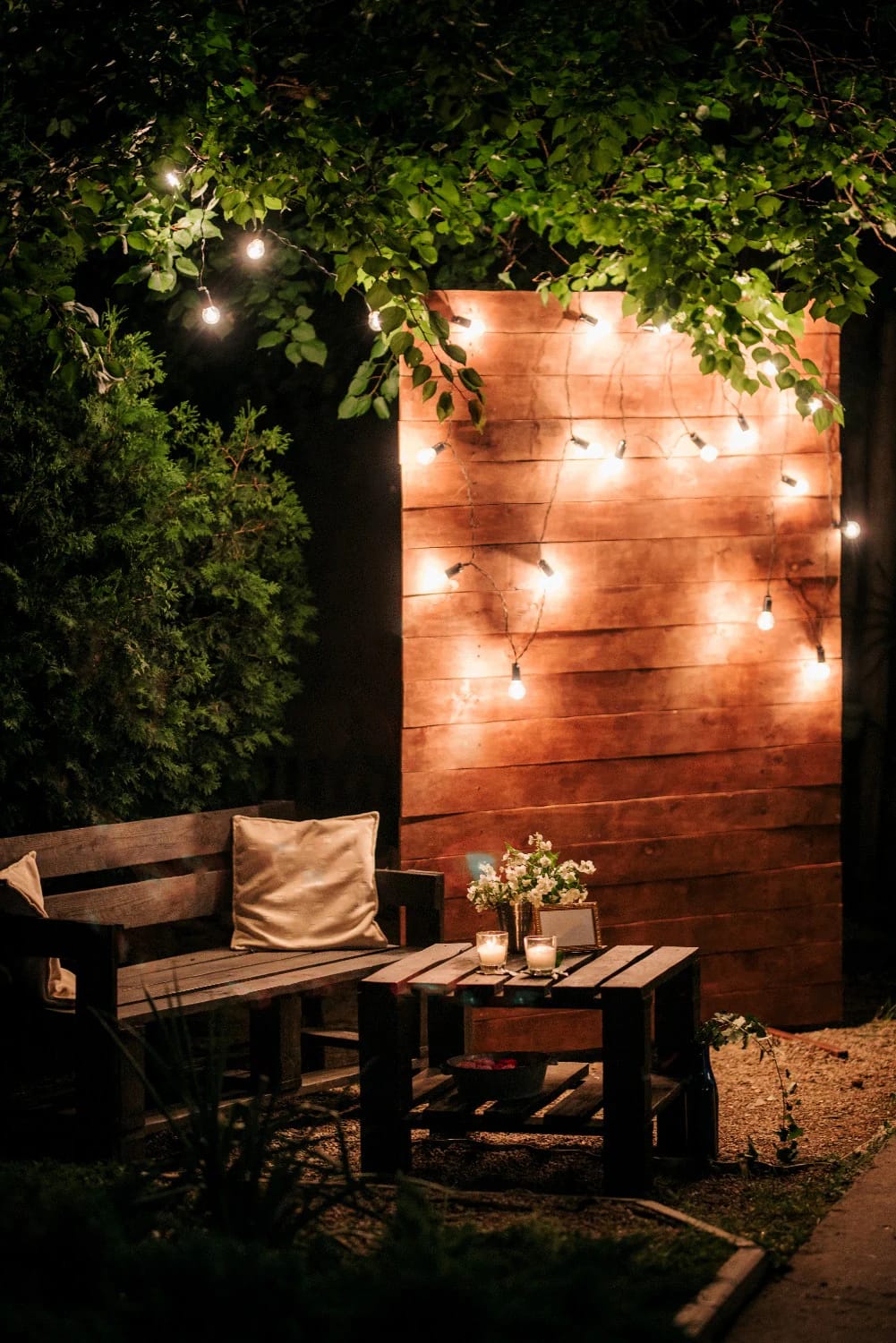 11 Small Backyard Ideas That Work in Under 400 Square Feet 15 hang string lights on a catenary, not on the fence tops 1