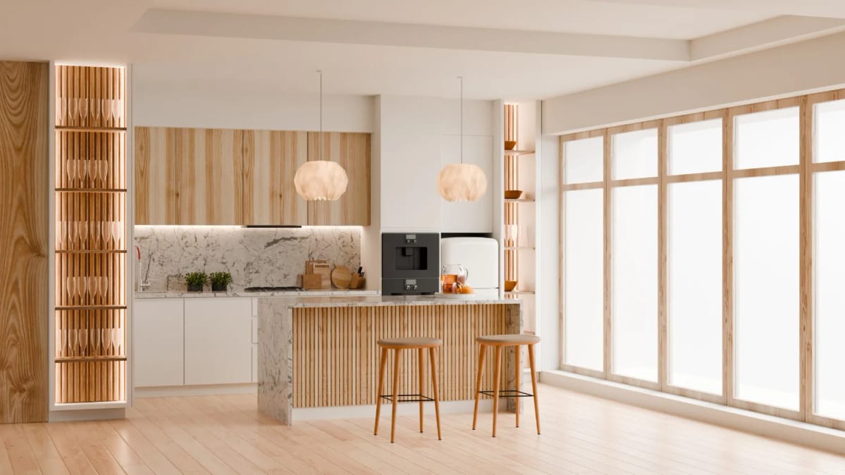 12 Japandi Kitchen Design Ideas That Survive Actual Cooking 1 A bright Japandi kitchen design featuring light wood accents, minimalist white cabinetry, marble countertops, two wooden stools at a central island, pendant lighting, and large windows allowing natural light to fill the space.