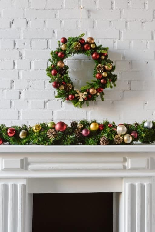layer a cheap faux base under a better strand for a full mantel garland 1