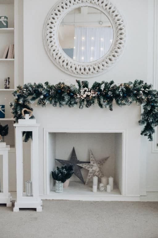 layer a cheap faux base under a better strand for a full mantel garland 1