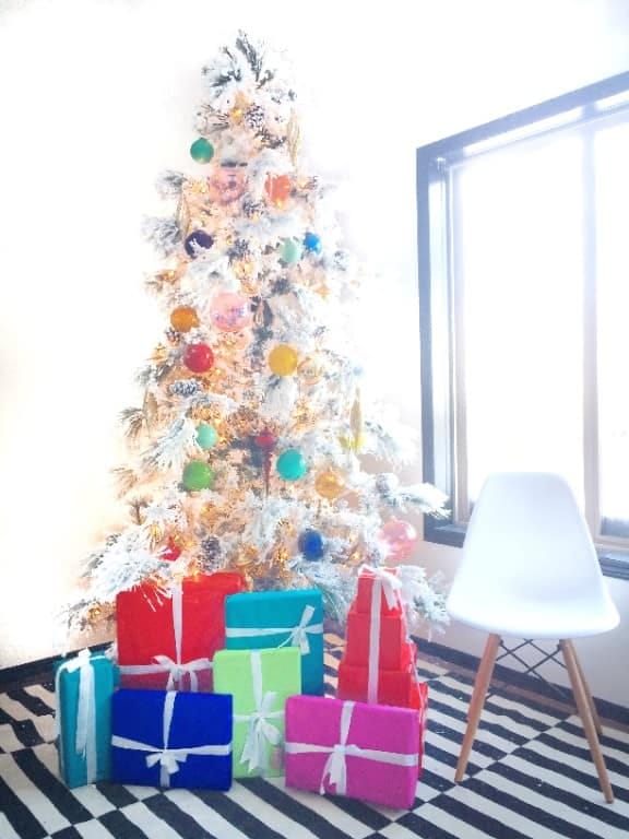 12 Whimsical Christmas Decor Ideas to Run Through the Whole House 4 skip the tasteful tonal tree, go full rainbow 1