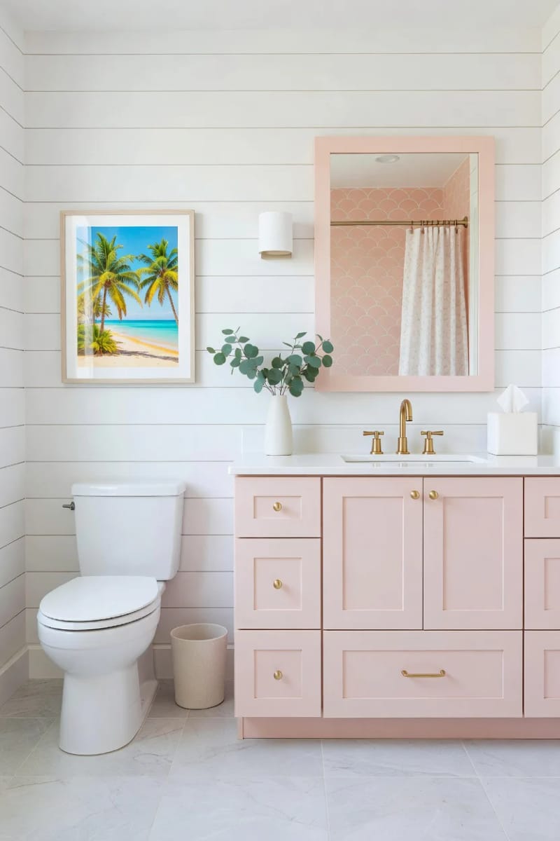 20 Pink Coastal Bathroom Ideas With a Breezy Finish 9 small bathroom with pink vanity, scallop-tile shower, and shiplap wall. 1
