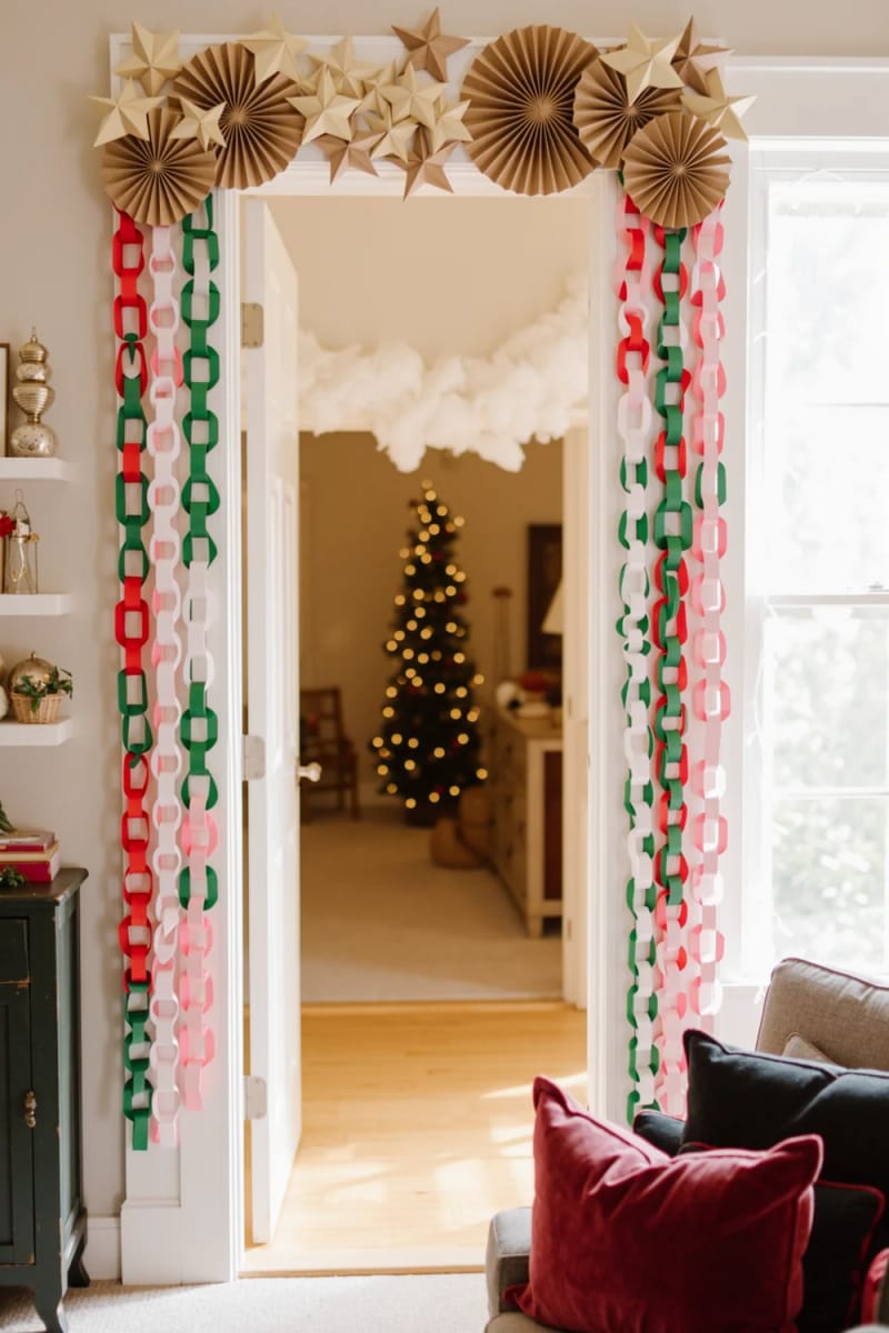 12 Whimsical Christmas Decor Ideas to Run Through the Whole House 15 string paper-chain garlands across every doorway 1
