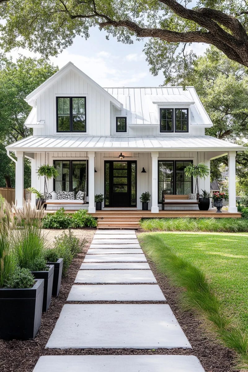 two-story modern farmhouse with board-and-batten siding and porch swing. 1