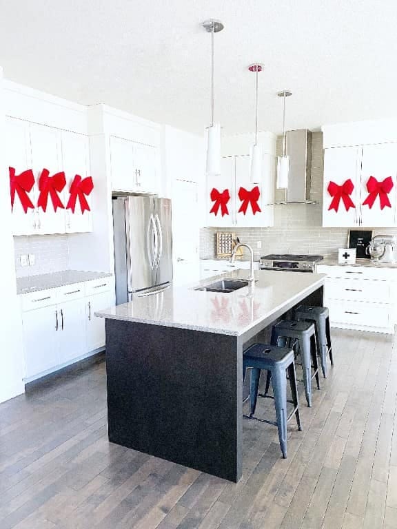 Christmas Kitchen Decor on a Budget: 9 Ideas Ranked by Impact per Dollar 9 wired ribbon bows beat the pre-made bow packs on cost 7