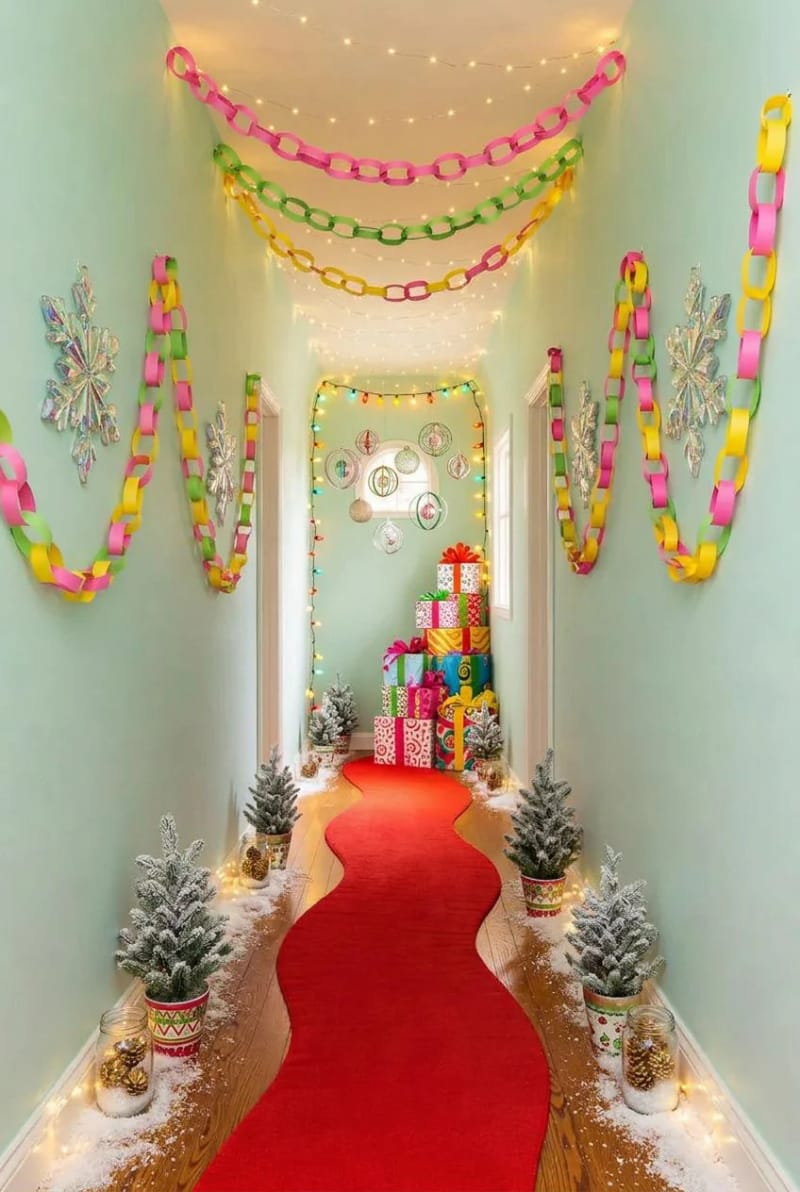 Whoville-Inspired Indoor Christmas Decorations That Skip the Generic Grinch Look 18 wrap a hallway or cubicle in cheer when a whole room isn't yours 1