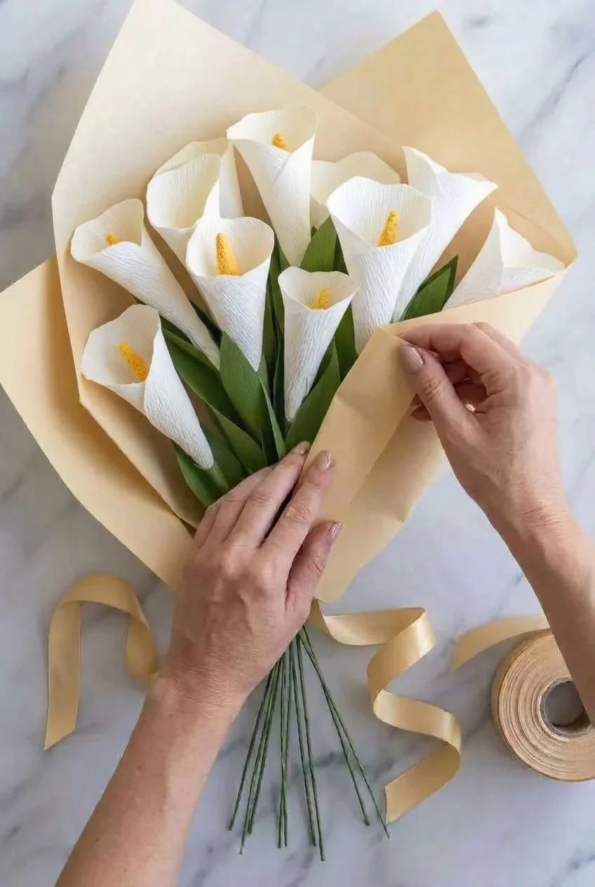 How to Make White Paper Calla Lilies That Hold Their Shape 9 wrap it, then tie the bow 1