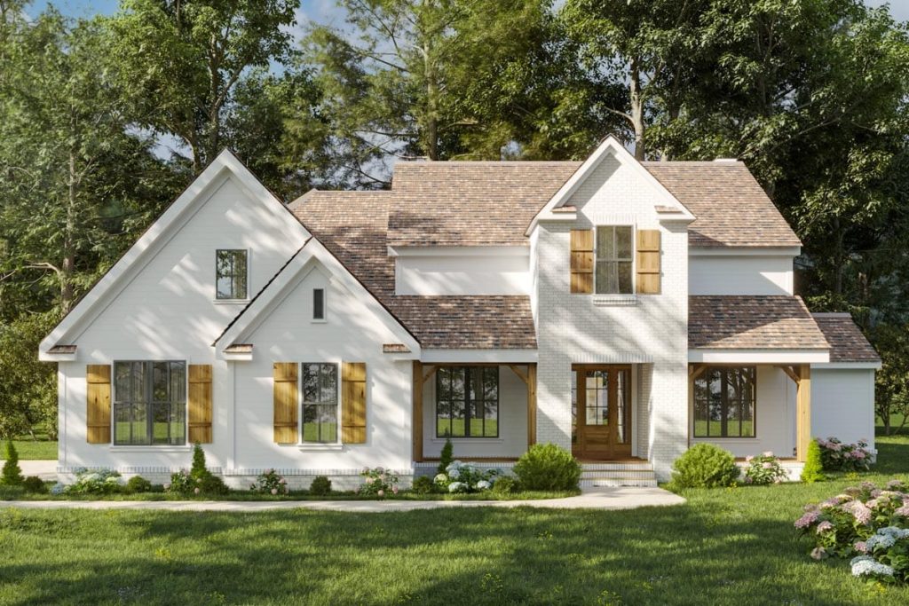 Modern farmhouse exterior with white siding, wood shutters, and a welcoming front porch