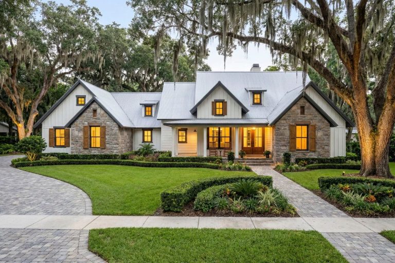 3-Bedroom New American Farmhouse House Plan with an L-Shaped Front Porch (1,988 Sq. Ft. Floor Plan) 1 Modern farmhouse with stone and board-and-batten siding, metal roof, and inviting front porch