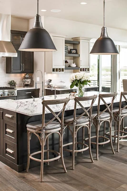 5-Bedroom New American House Plan with Views to the Rear (2,682 Sq. Ft. Floor Plan) 8 a ten-foot kitchen island under two black domes 1