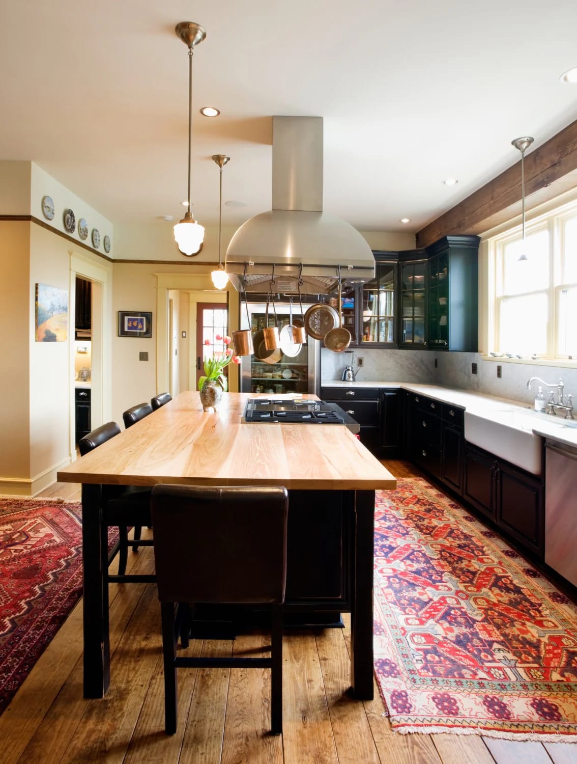Boho Kitchen Ideas That Hold Up to Actual Cooking 14 a vintage kilim underfoot, not a printed "boho" mat 1