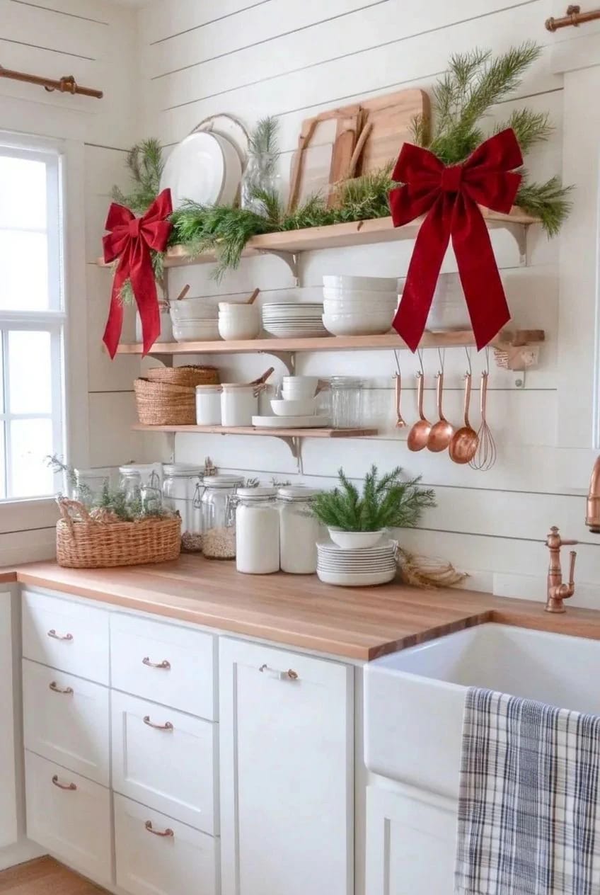 Farmhouse Christmas Kitchen Decor Ideas That Survive an Actual December 15 fresh greenery goes on the open shelving, never on the range hood 1