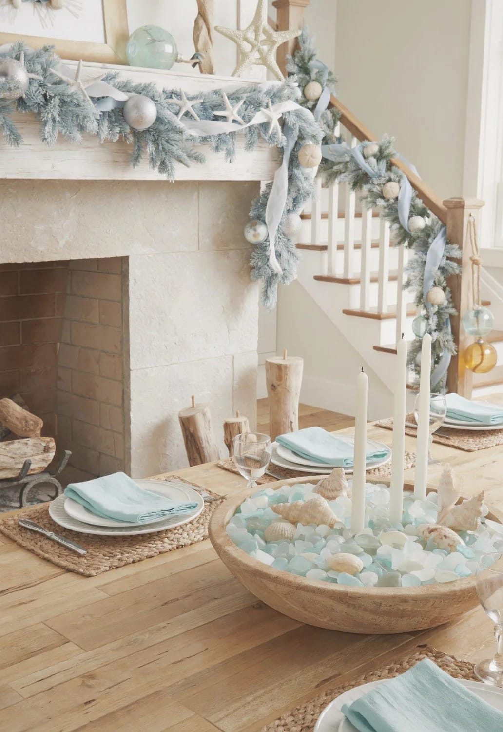 13 Coastal Blue Christmas Decorations That Skip the Anchors and Life Rings 21 mantel, stairs, and the dining table 1